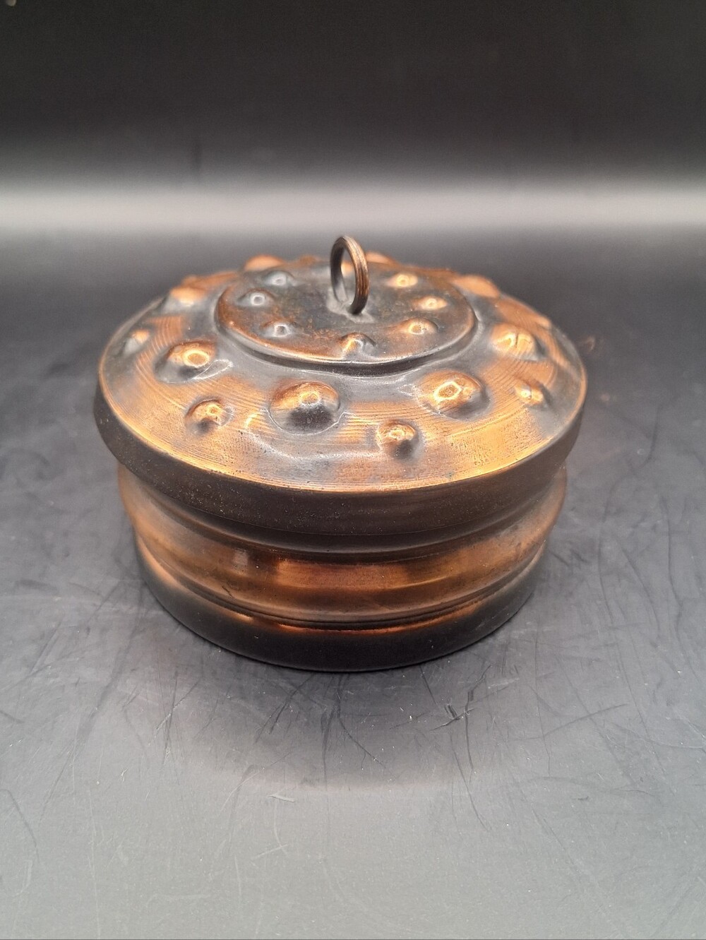 Linger Bronze Round Velvet Lined Trinket Box is a vintage collectible.